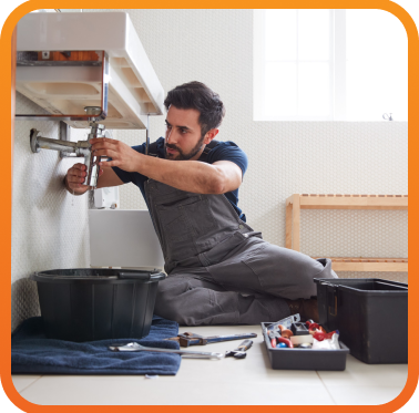 tech repairing sink pipes